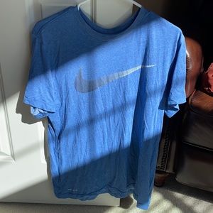 Blue Nike shirt